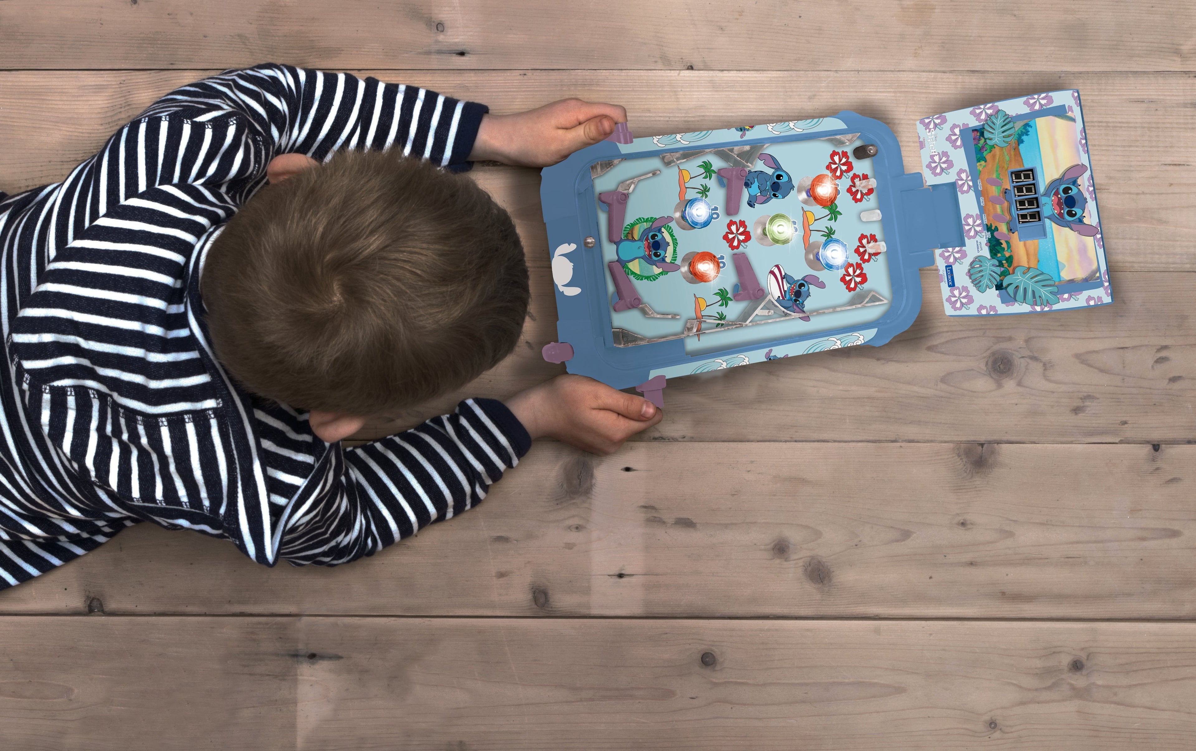 Stitch electronic table pinball with a great design, sounds, lights and digital scoring to play alone or challenge your friends.